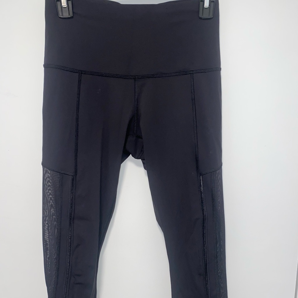 Lululemon cropped black leggings with mesh cutouts